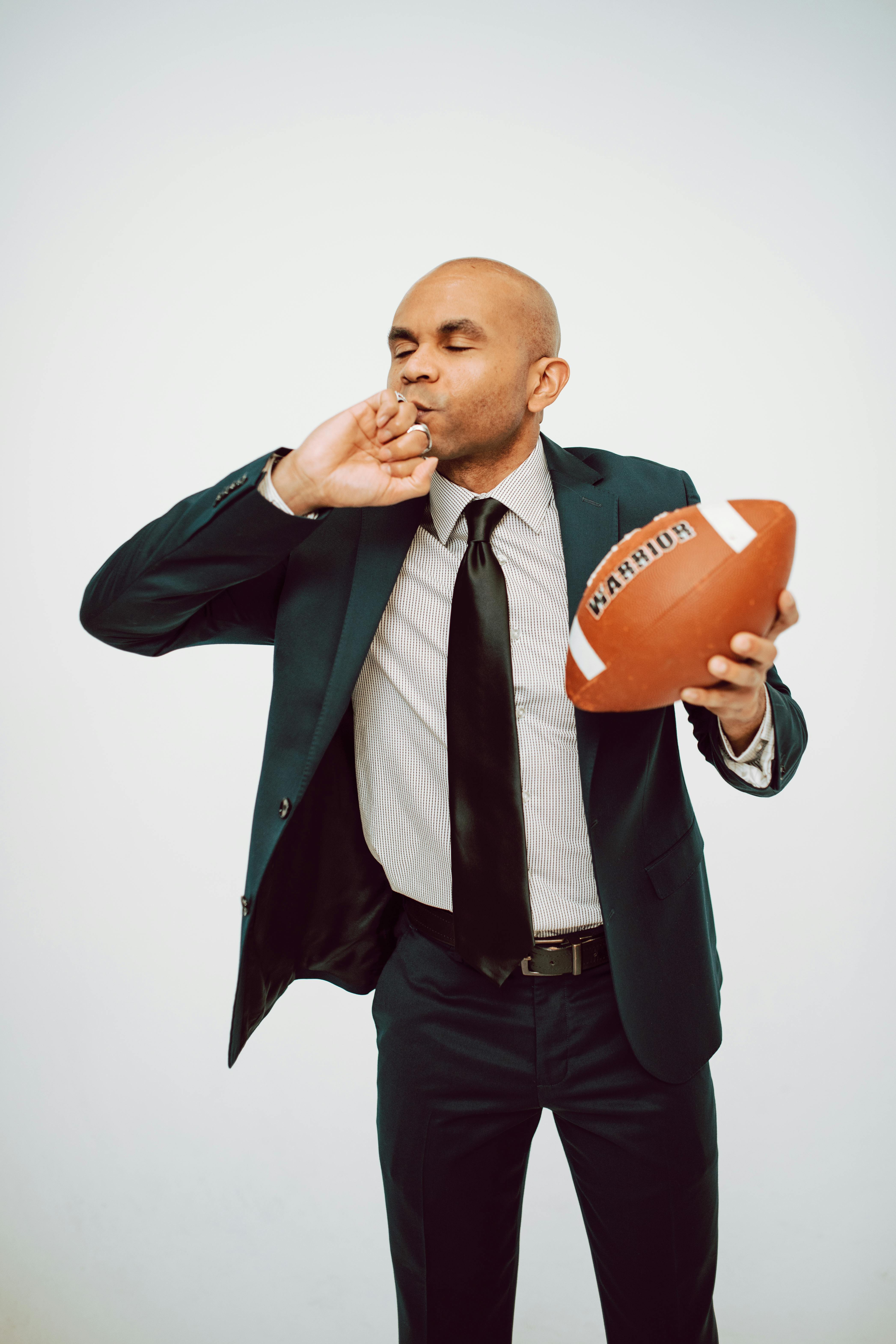 Man Holding Football · Free Stock Photo