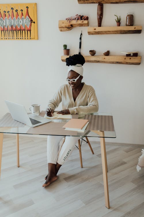 Free A Happy Woman Working From Home Stock Photo