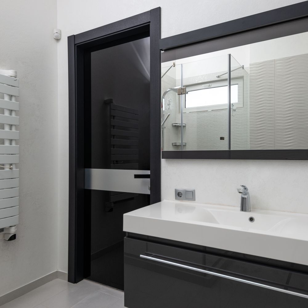 uPVC Spraying in Little Venice — clean edges cut in around trim and sockets