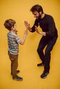 A Man Playing with a Boy