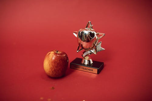 A Best Teacher Trophy and an Apple