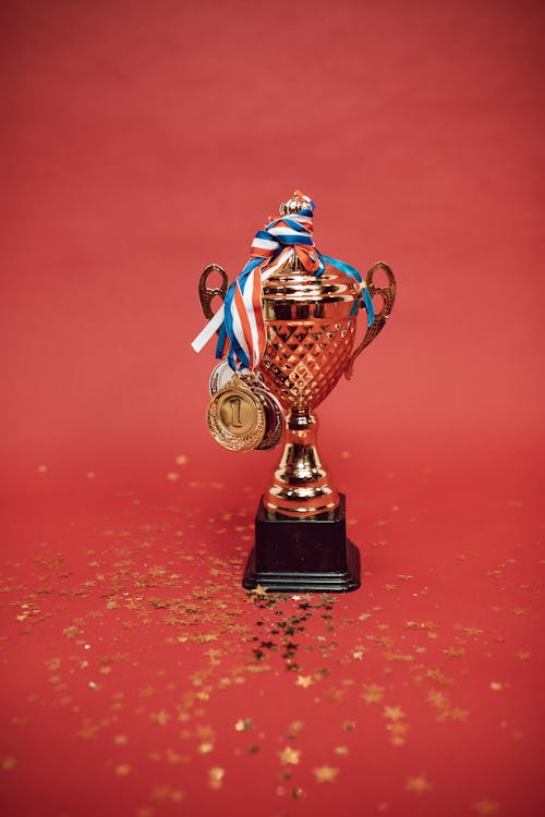 Free Medals Tied on a Trophy Stock Photo