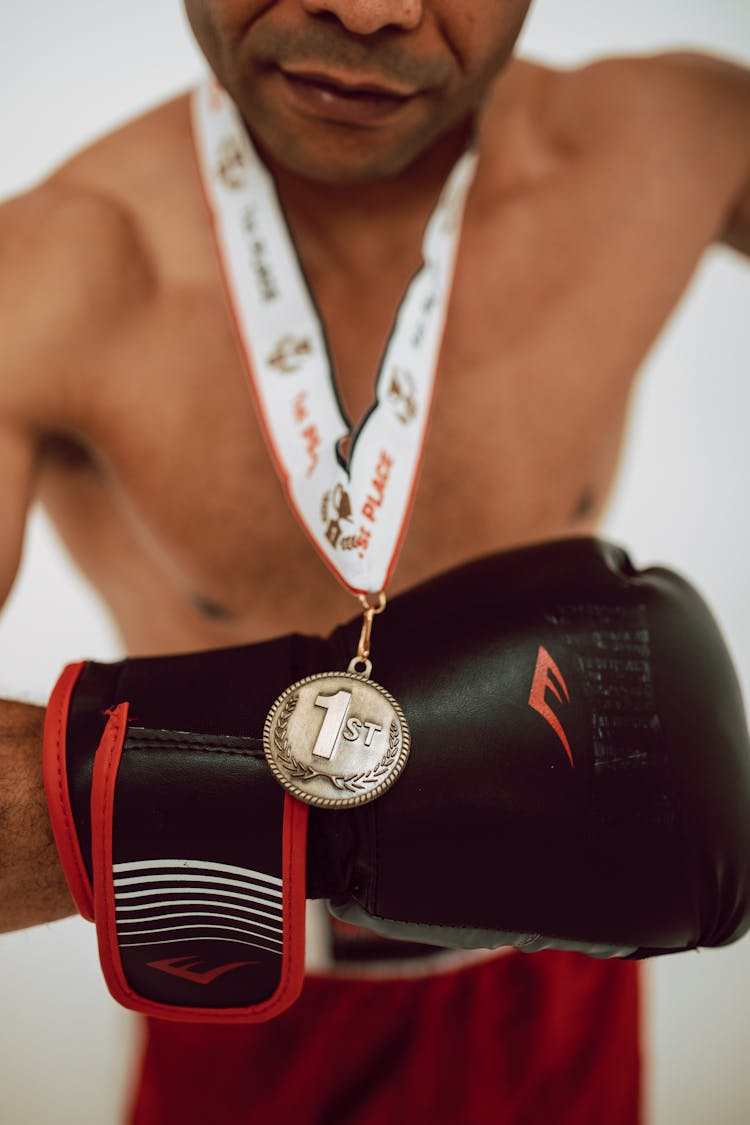 A Medal On A Boxing Glove