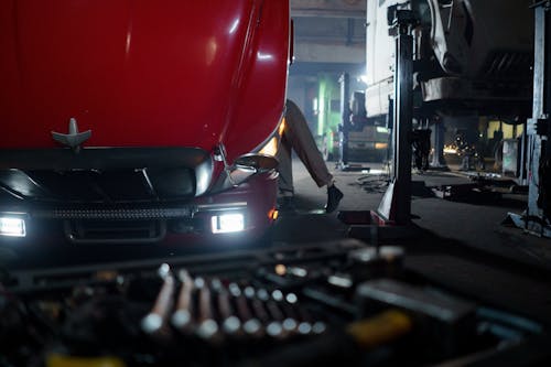 A Person Fixing a Truck