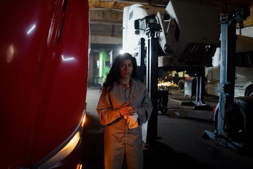 A Woman Working in the Automotive Shop