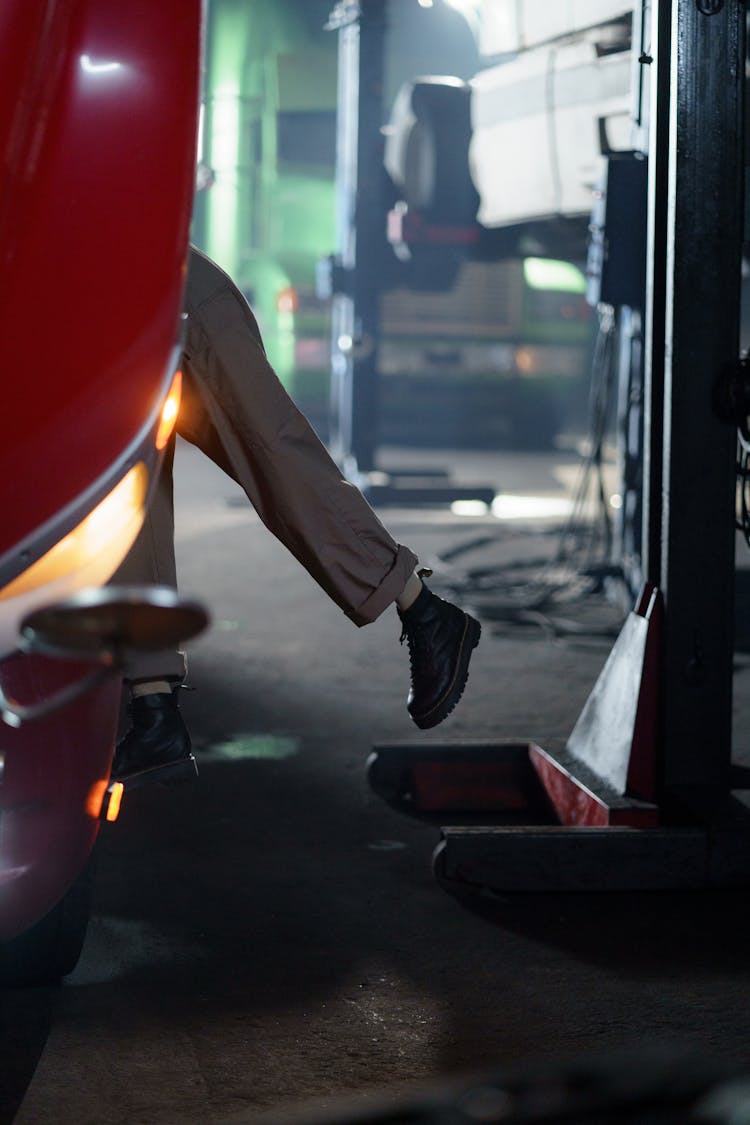 A Person Fixing A Truck