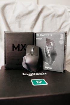 Logitech MX Master 3 wireless mouse with packaging, highlighting modern design and ergonomic features.