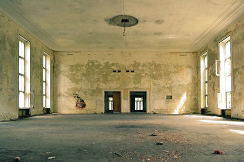 Brown Wooden Door Inside Abandoned Room