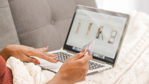 Free A Person Doing Online Shopping Stock Photo