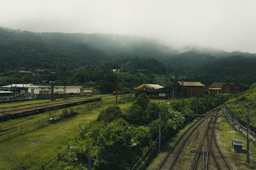 Free stock photo of fog, railings, railway line Stock Photo
