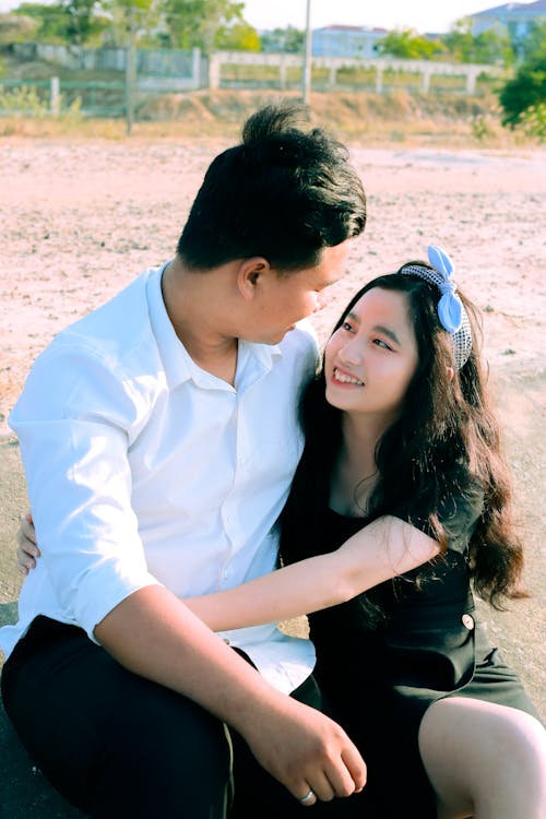 A Couple Hugging in the beach