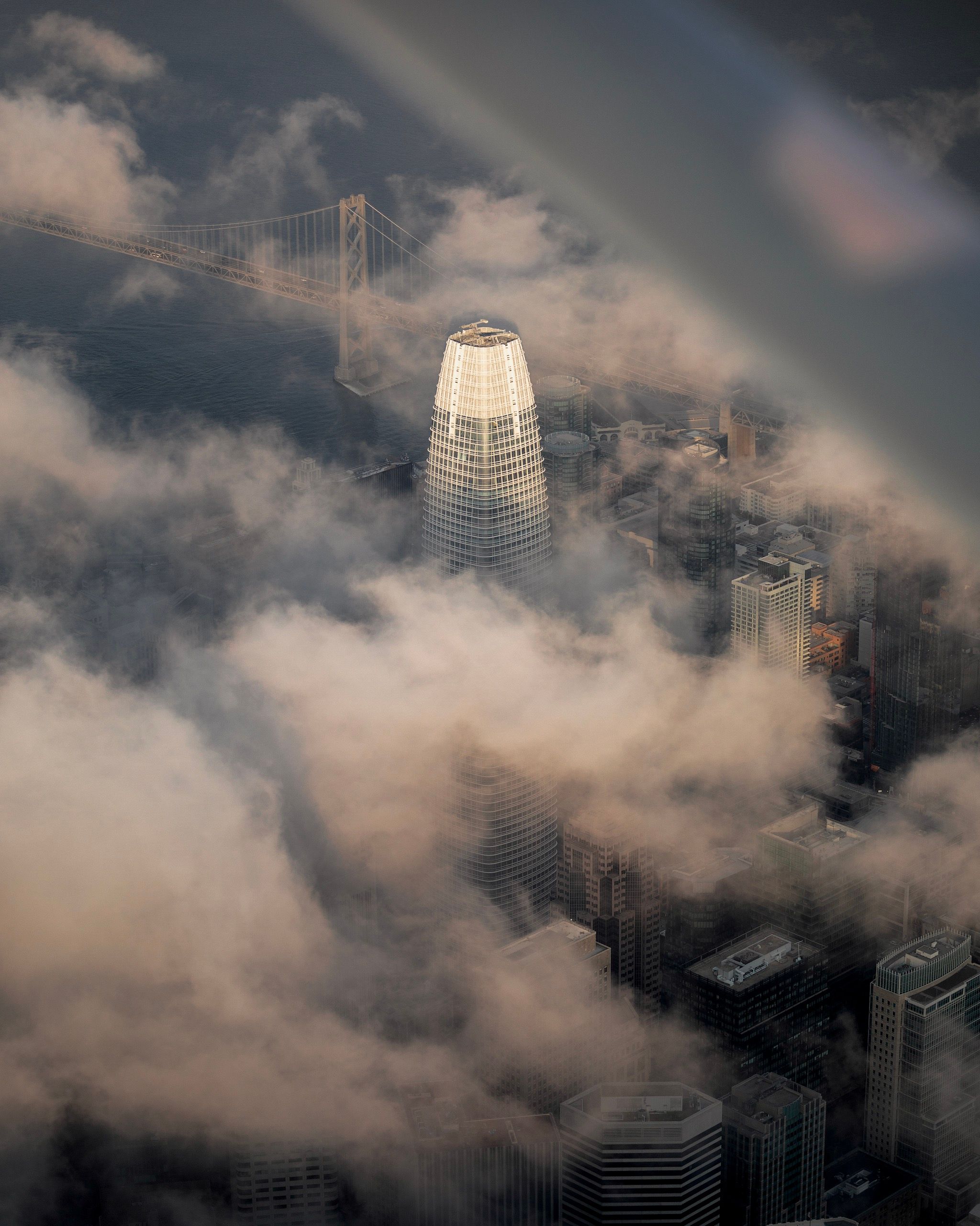 Aerial View of City Under Cloudy Sky · Free Stock Photo