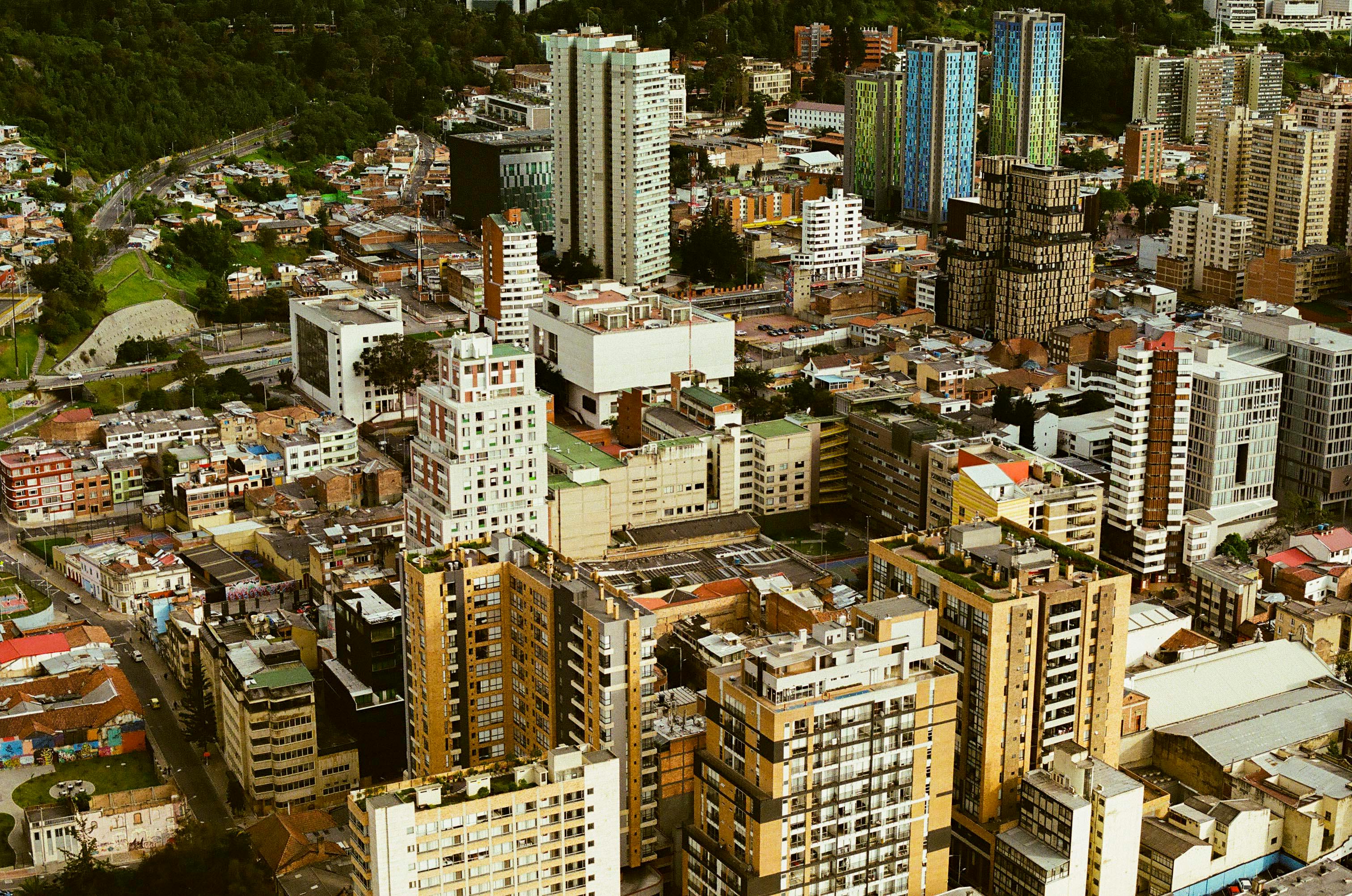 Dynamic aerial cityscape capturing the modern skyline of Bogotá, Colombia.