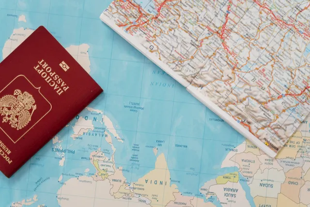 Travel planning setup with map and passport