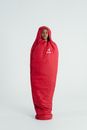 Man Standing Inside A Red Sleeping Bag