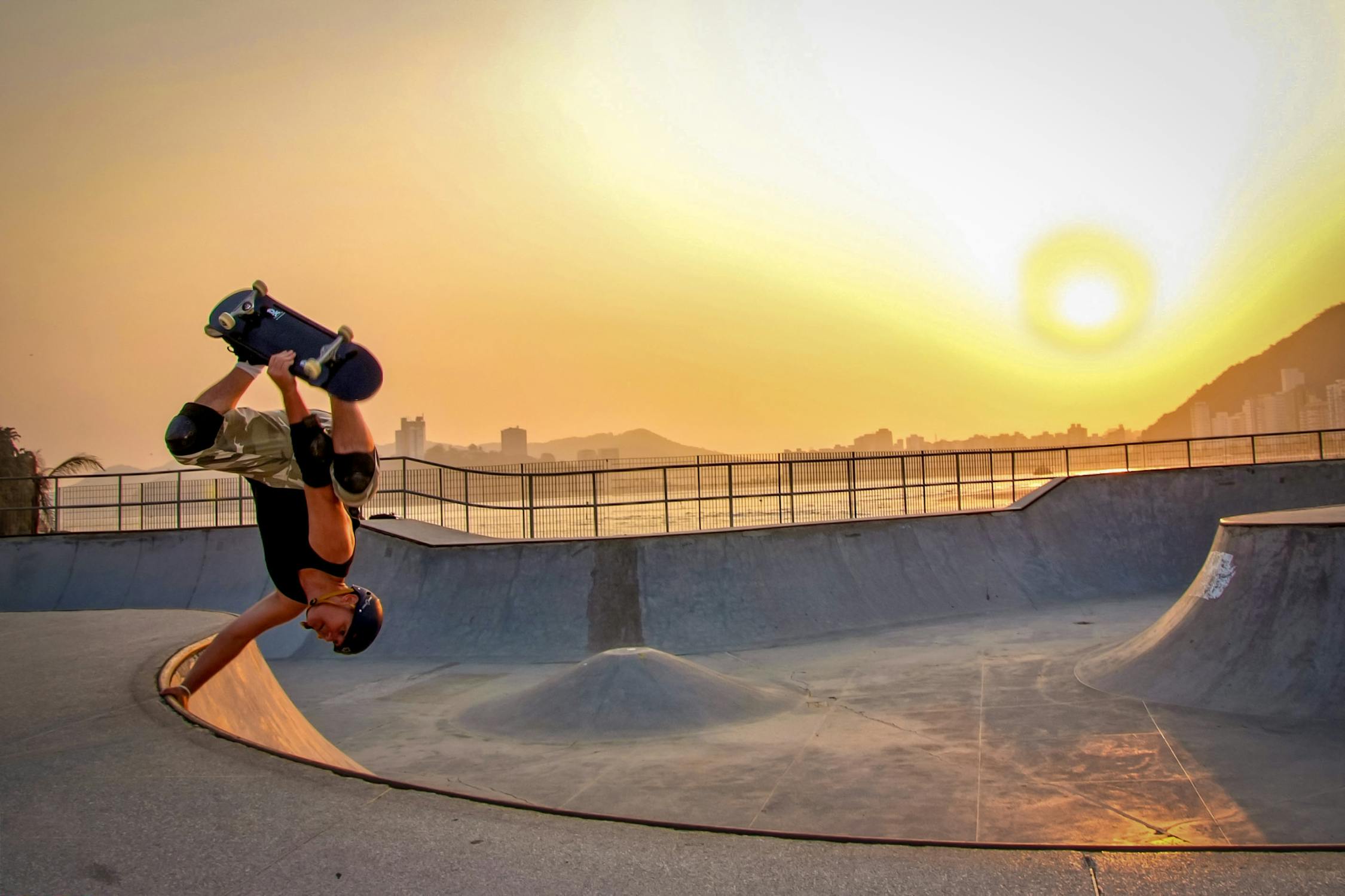 skateboarder doing hand plant