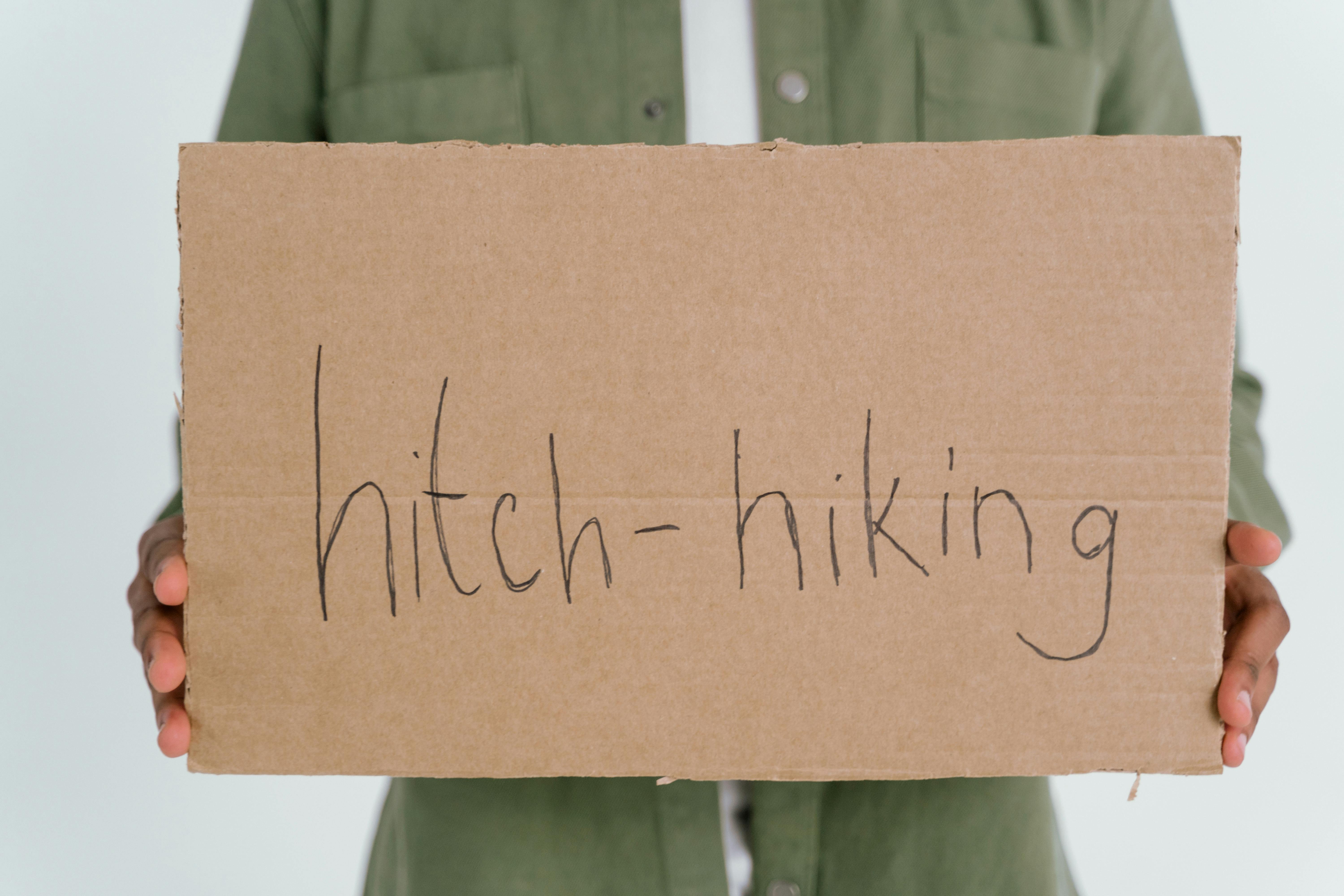 Close-up Photo of Cardboard held by a Person 