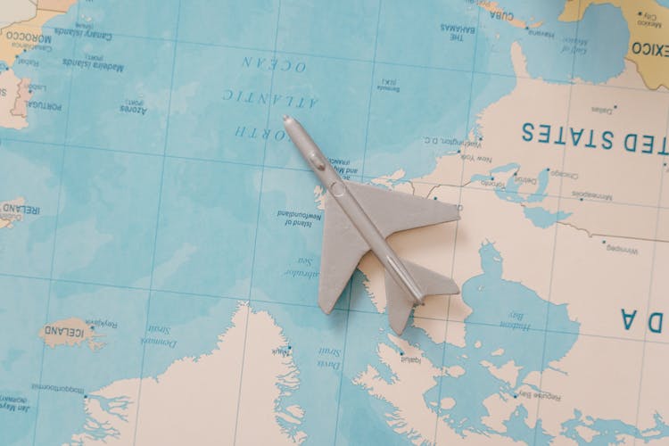 Airplane Toy On A Map