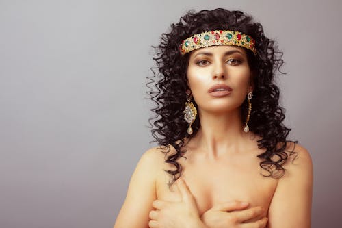 Topless woman with jewelry headband