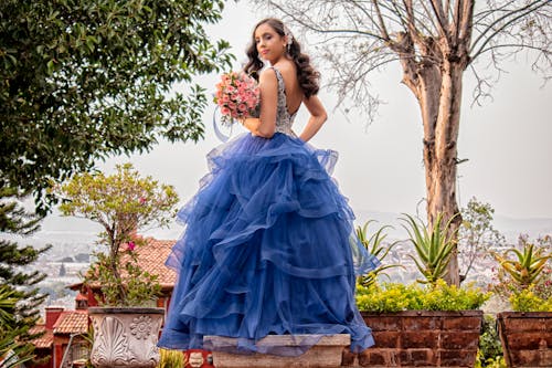 Woman in Blue Gown Looking Back