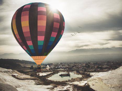 Hot-air balloon over travertines — Pamukkale