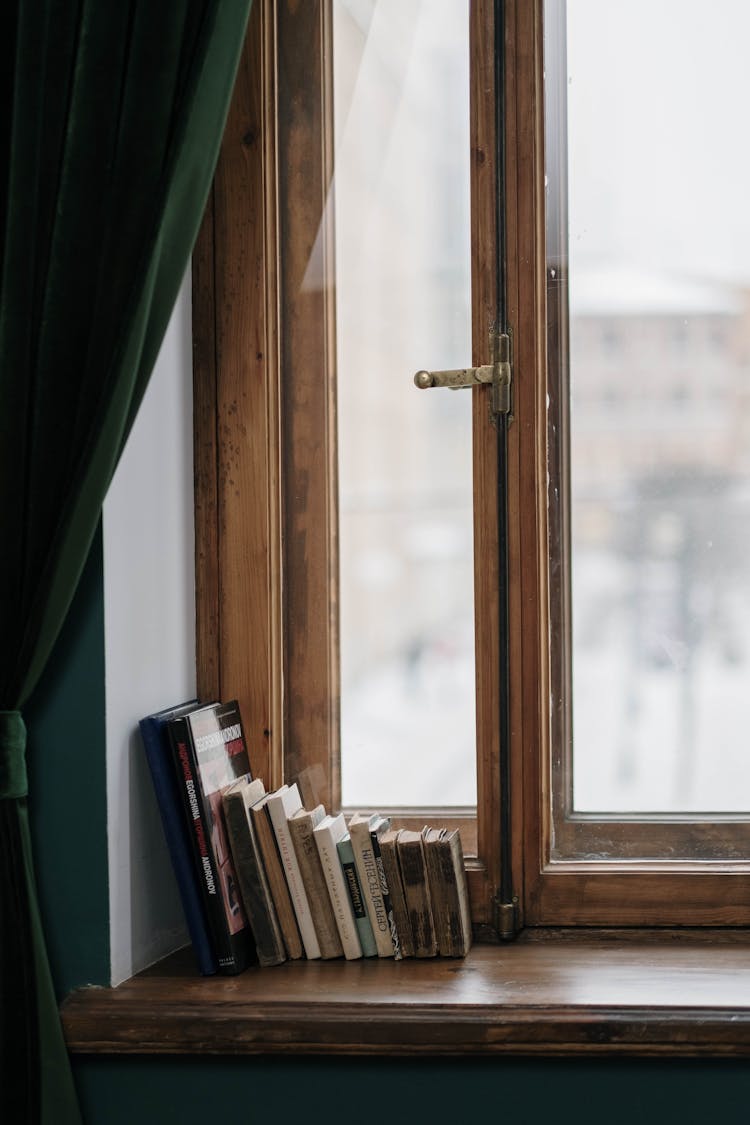 Books On A Wooden Window 