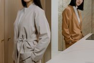 Woman in White Long Sleeve Shirt Standing Near White Table