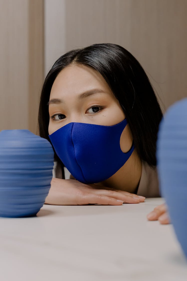 Woman In Blue Face Mask