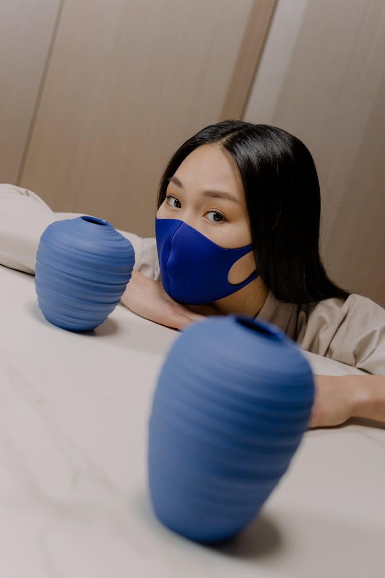 Woman In Blue Face Mask