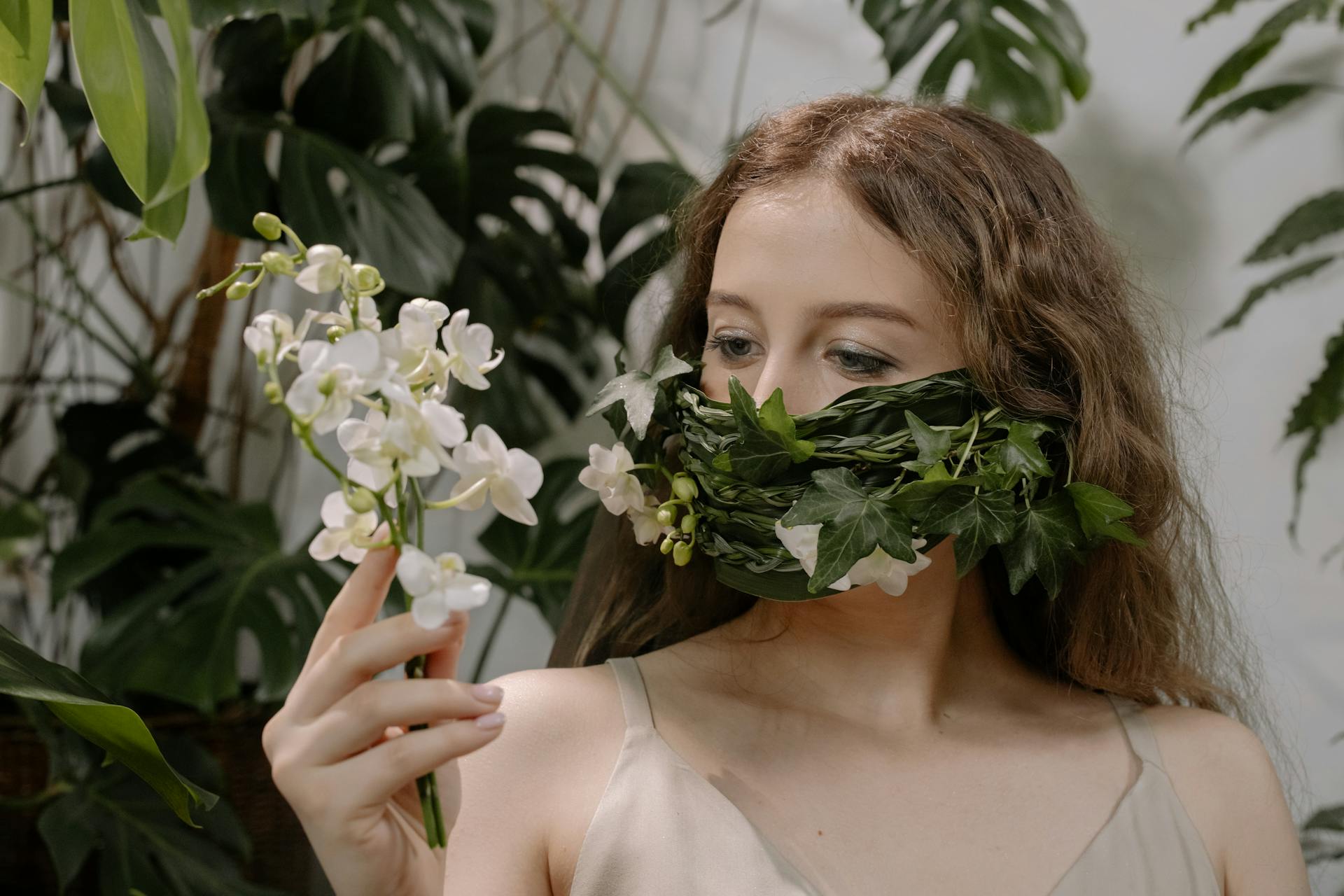 Plants Covering the Woman's Face