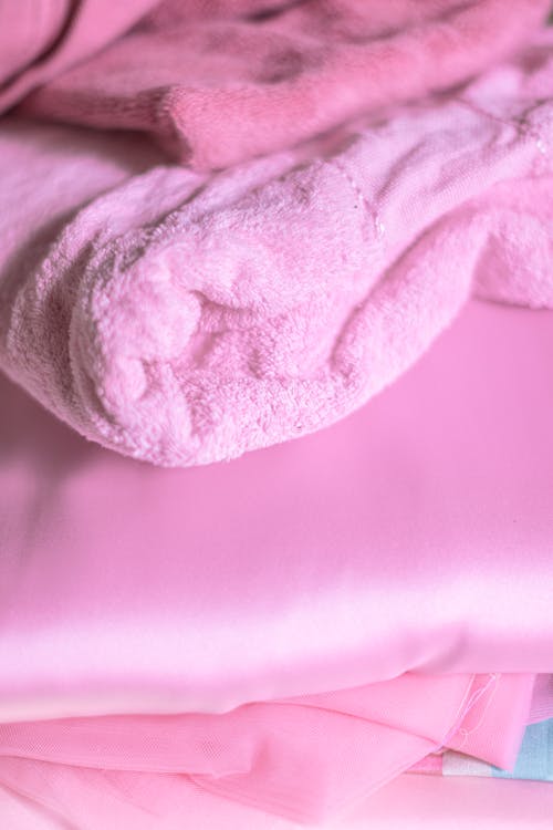 Free White Textile on Pink Textile Stock Photo