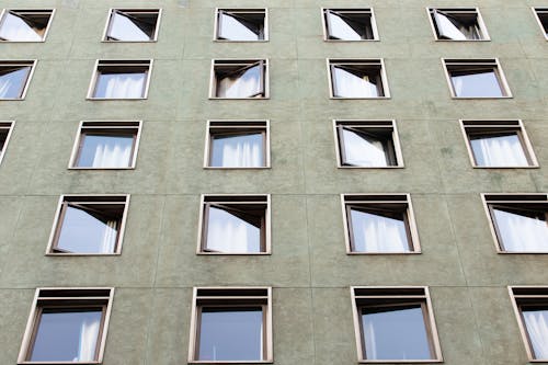 Photo of a Green Building with Windows