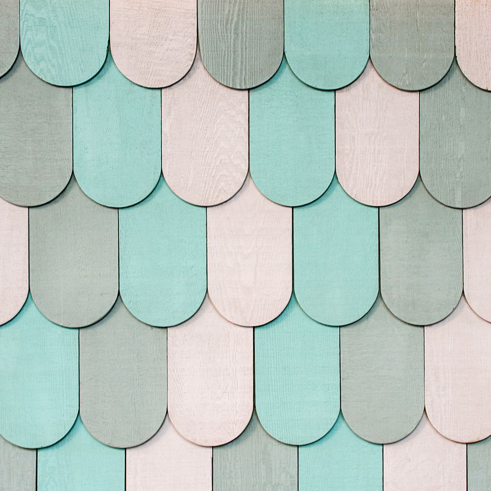 Wallpapering in Temple Fortune — a decorator at work mid-project
