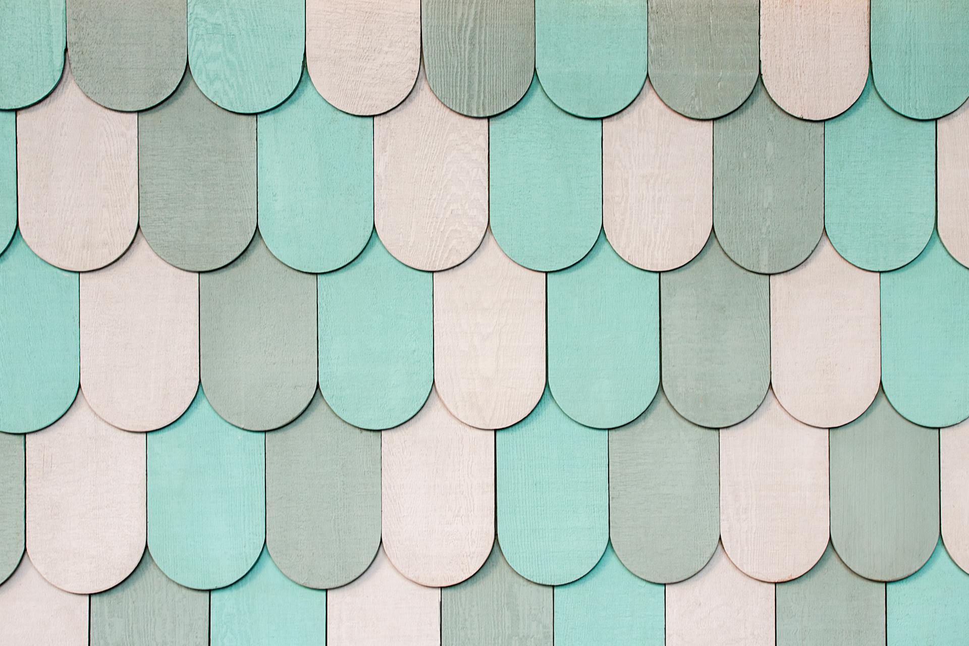 Colorful overlapping wooden shingles create a soothing, textured pattern.