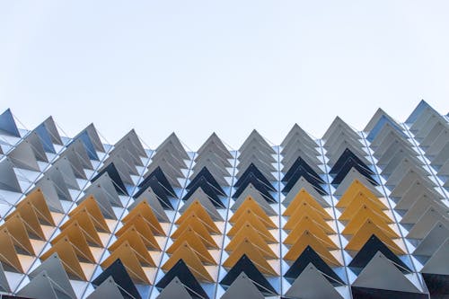 Low-Angle Shot of a Building with Triangle Shapes