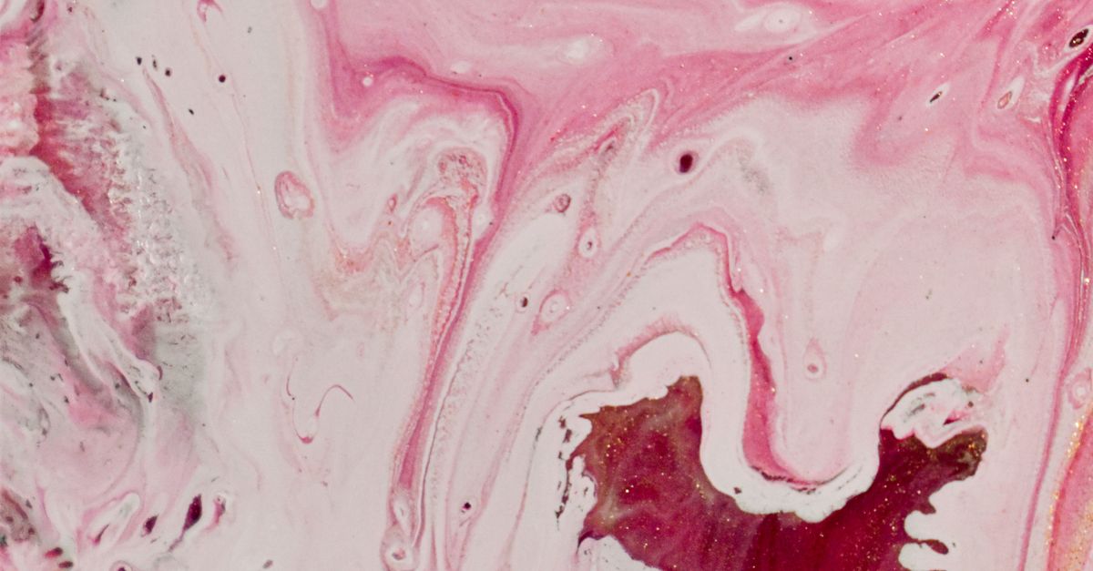 Messy pink and white dyes mixed as abstract background · Free Stock Photo