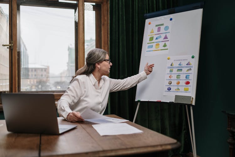 Elderly Woman Teaching Online