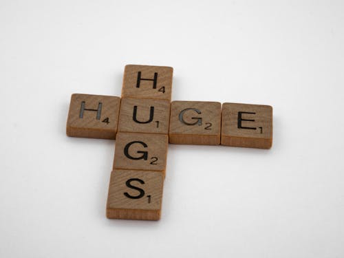 Brown Wooden Blocks on White Surface