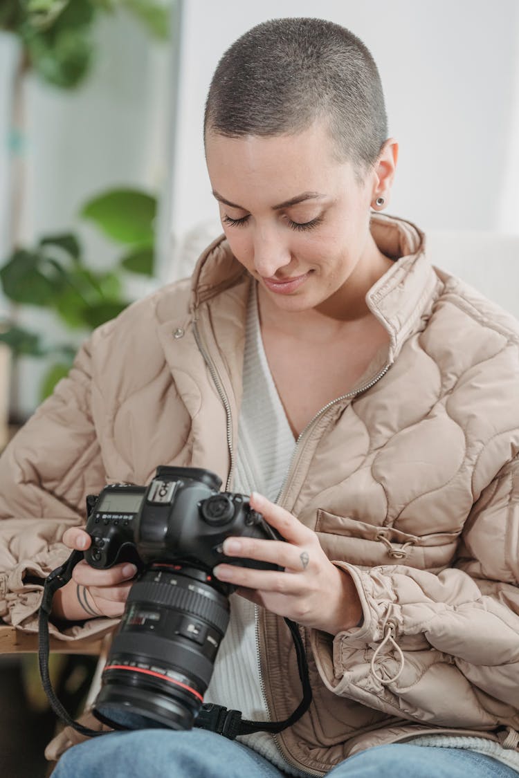 Portrait Of A Woman With Short Hair Looking At A Camera