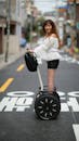 A Woman Riding a Segway