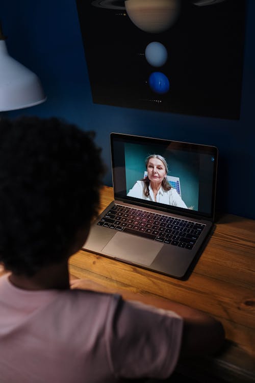 A Student Listening to Online Class