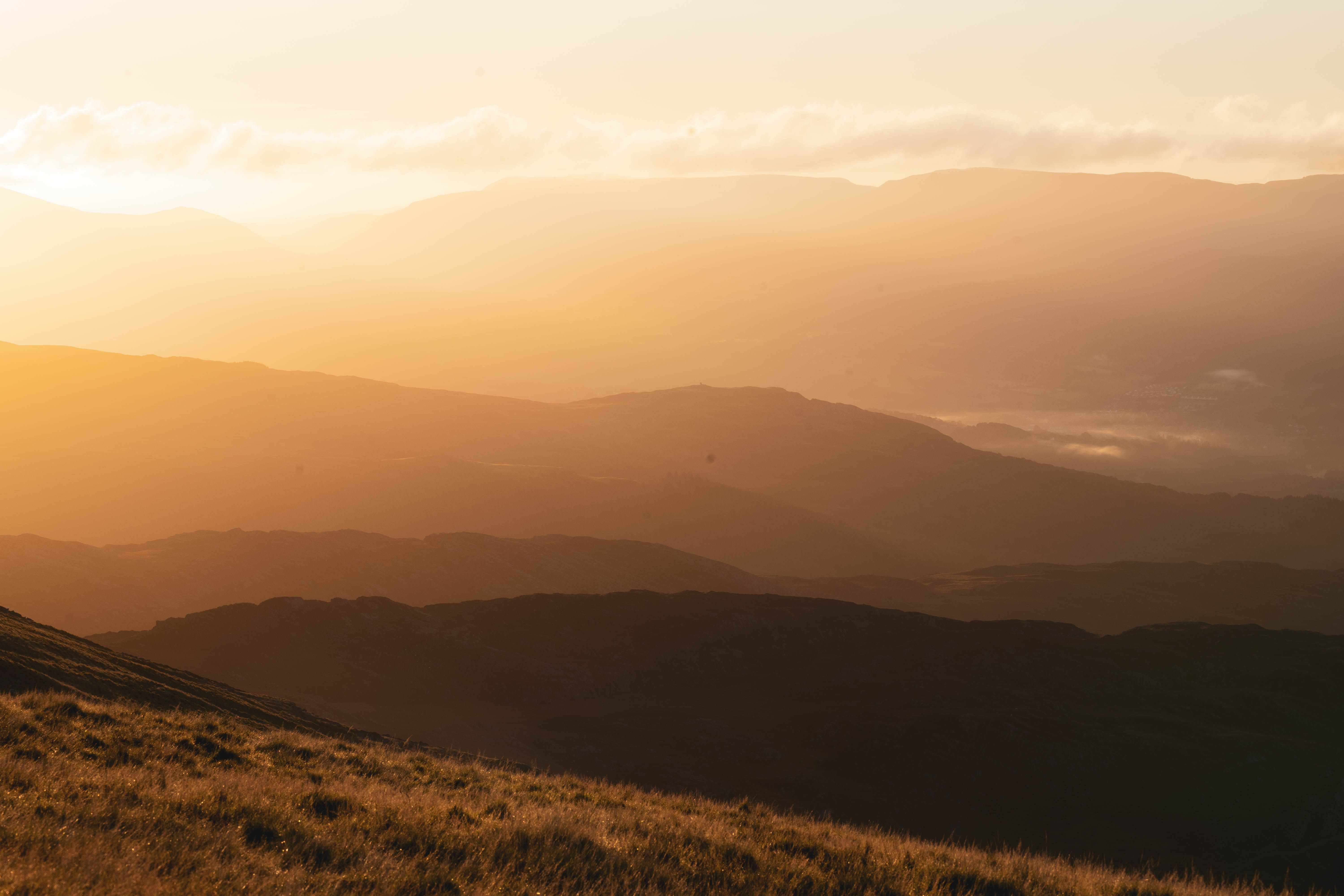 Aerial Photography of Mountains during Golden Hour · Free Stock Photo