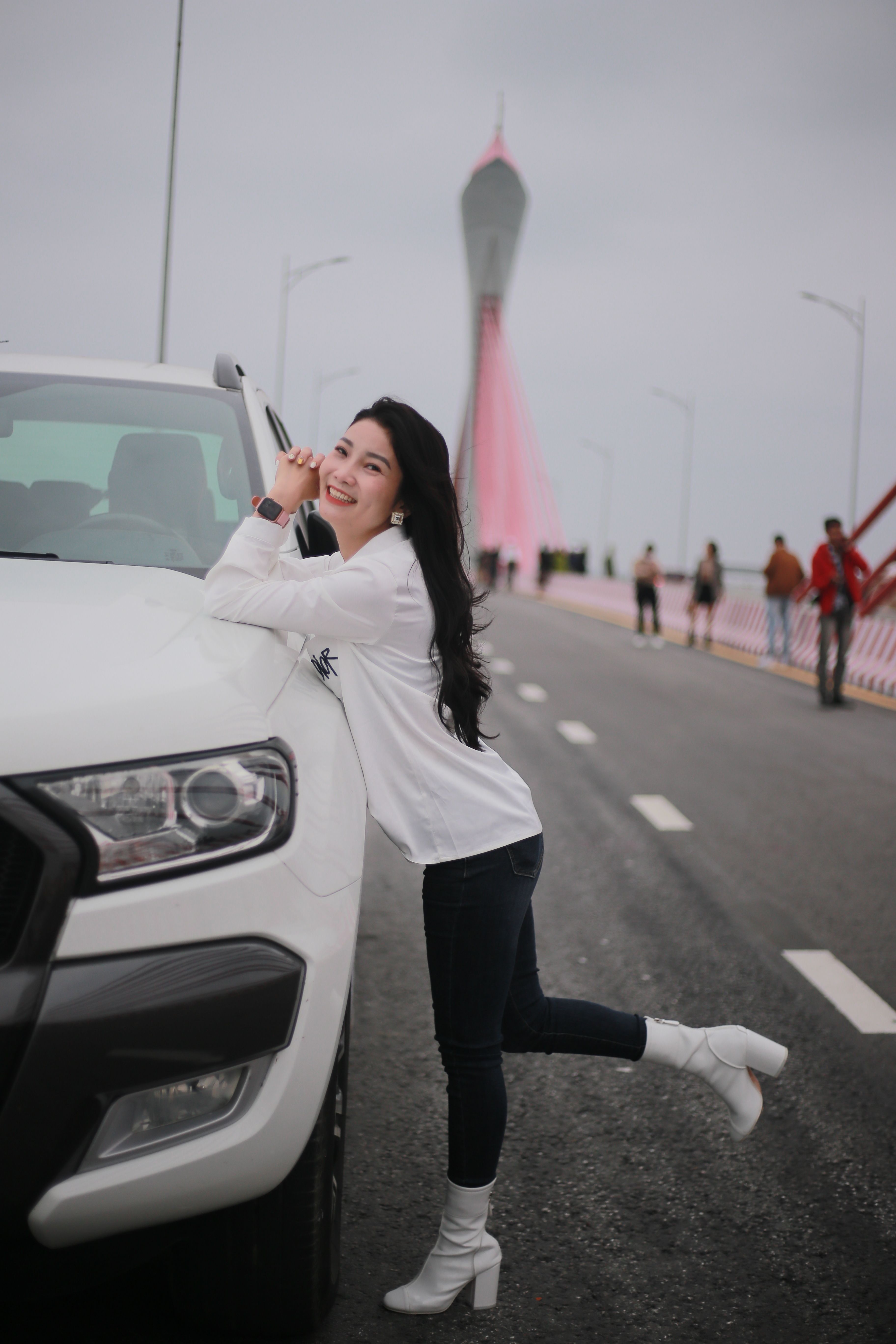Woman in White Long Sleeve Shirt Standing Beside a White Car · Free ...
