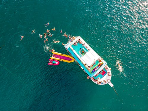 Aerial View of a Yacht on a Body of Water