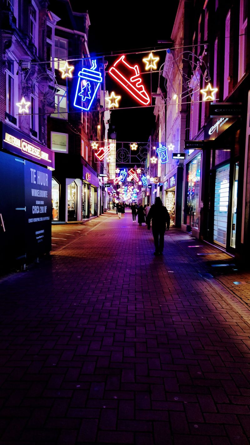 Person browsing products and feeling the impulse to buy representing the psychological mechanisms that marketing and retail environments are specifically designed to exploit in ways that override rational financial decision-making