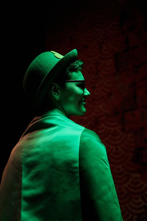 Person Wearing a Green Hat