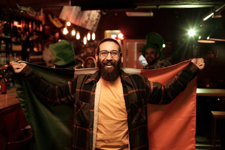 Bearded Man Holding A Flag