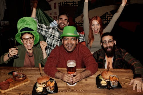 People Celebrating Saint Patrick's Day at a Restaurant