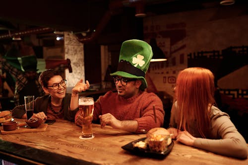 People Celebrating Saint Patrick's Day in the Bar