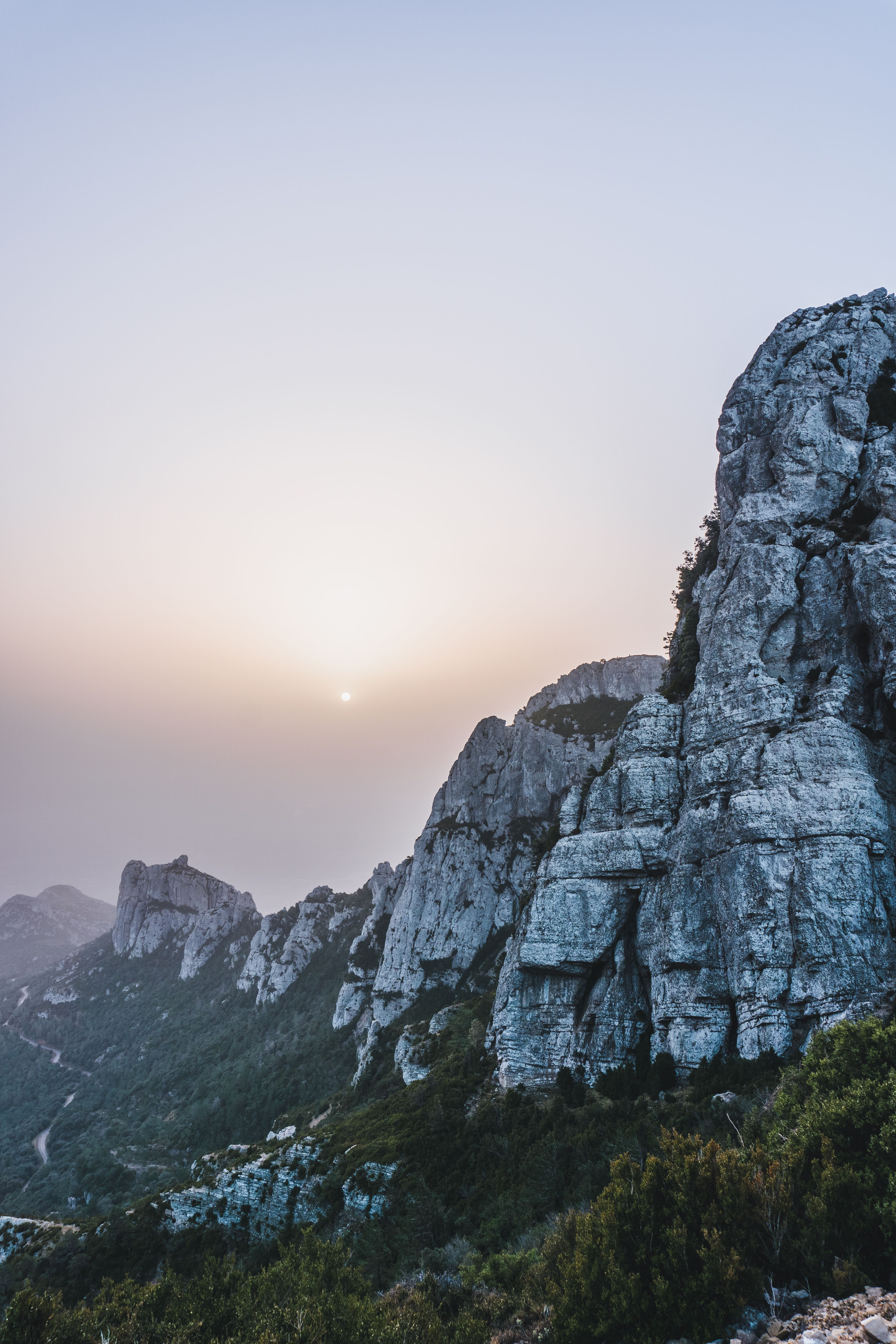 Steep rocky formations in mountainous terrain · Free Stock Photo